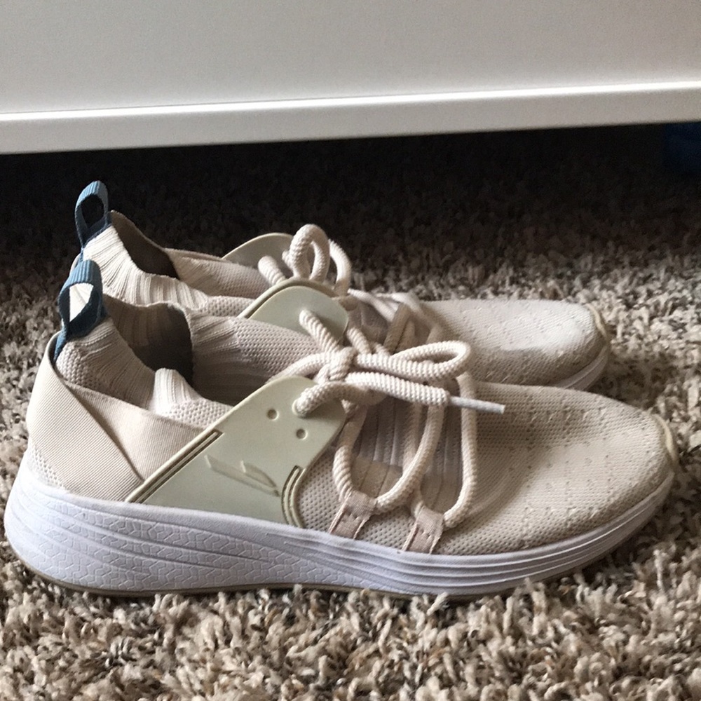 Beige “sock” tennis shoes. Very comfortable, lightly worn